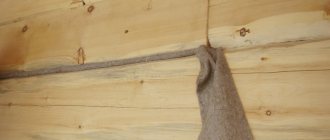 How to properly caulk a house made of timber?