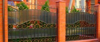 Beautiful fence on brick pillars with forging and polycarbonate