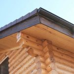 Lining roof overhangs with corrugated sheets